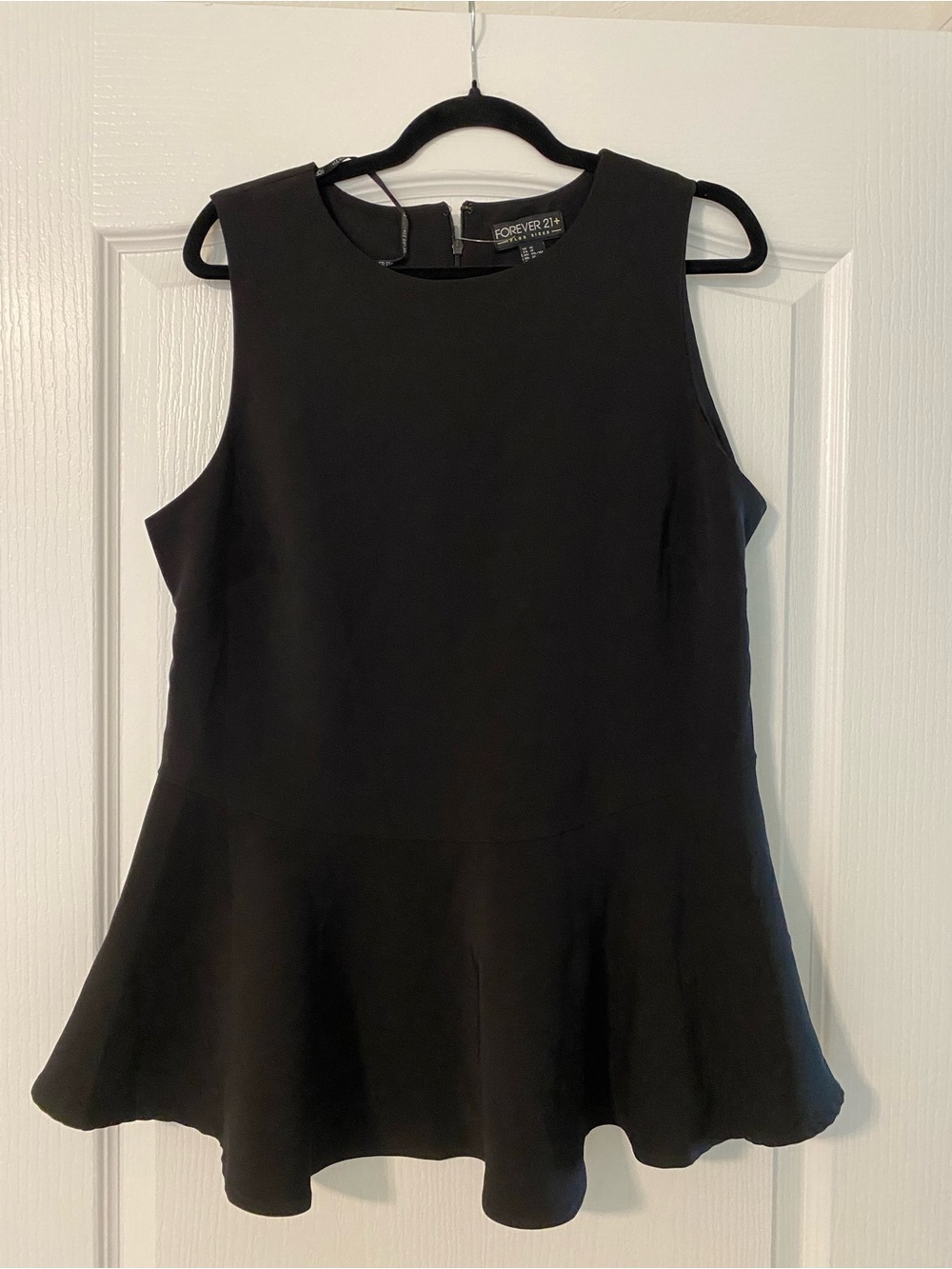 Forever 21 Black Sleeveless Flared Peplum Top